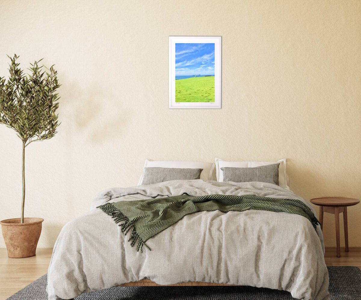 Seaside grassland and lighthouse